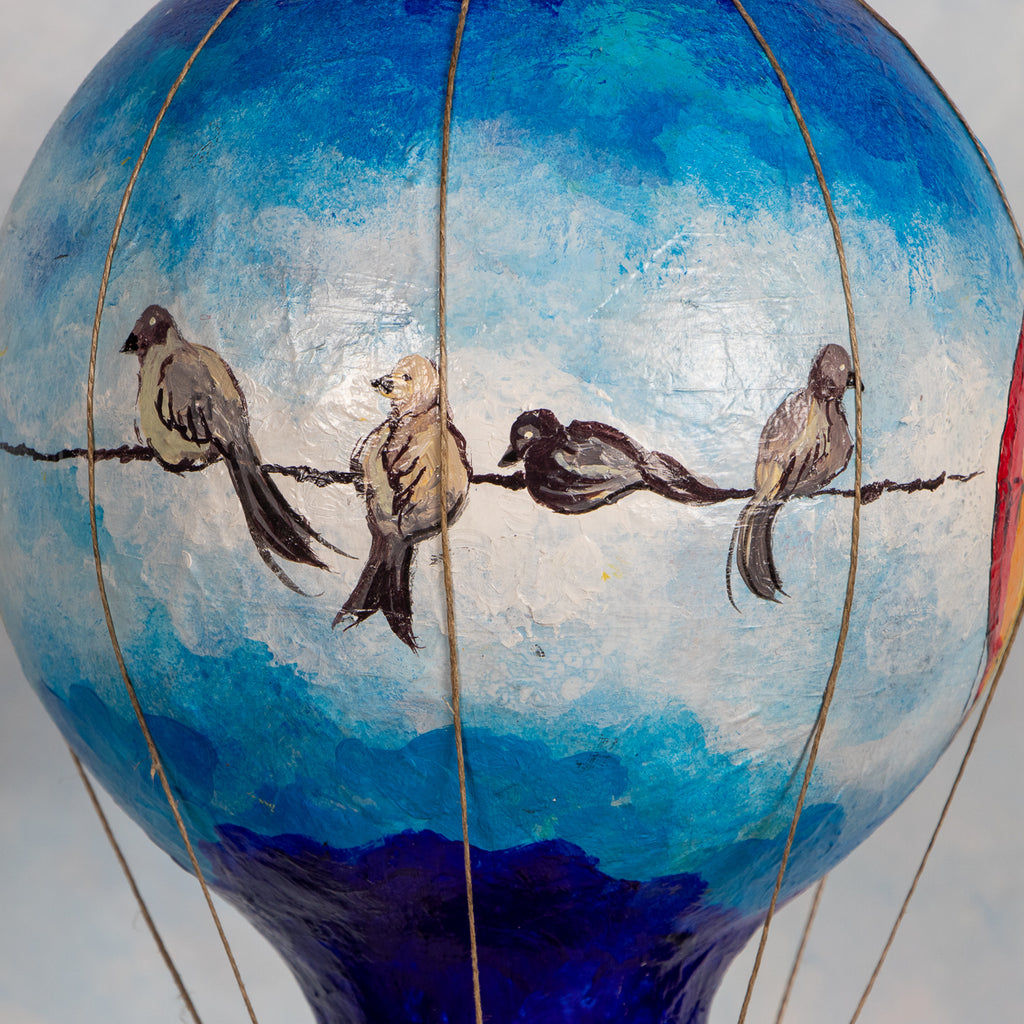 BIRDS ON A WIRE